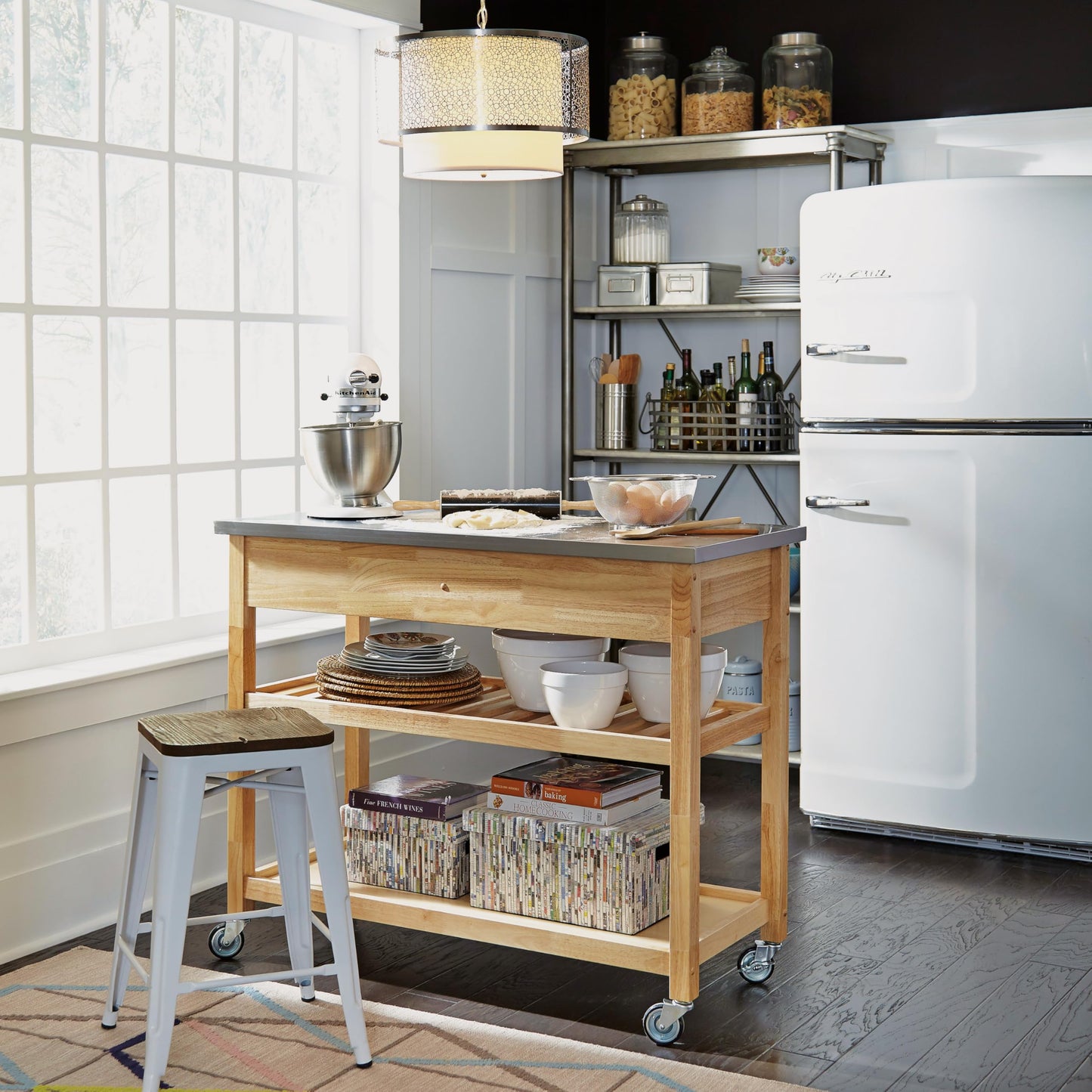 Home Styles Natural Designer Utility Kitchen Cart with Stainless Steel Top, Two Utility Drawers, Adjustable Shelf and Industrial Casters, Optional Wine Storage,Brown